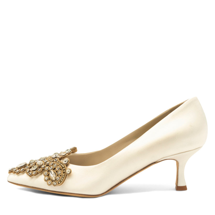 A beige satin kitten heel pump with crystal embroidery detail.
