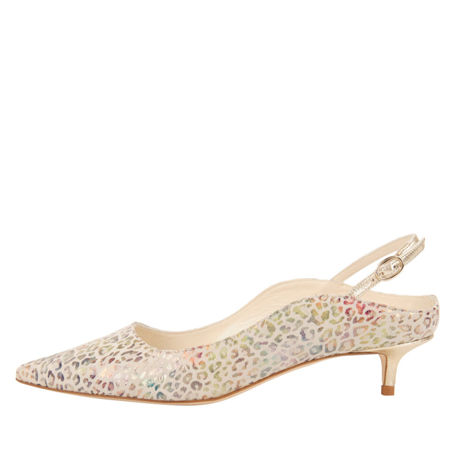 A silver floral print slingback kitten heel mule shoe with an adjustable strap.